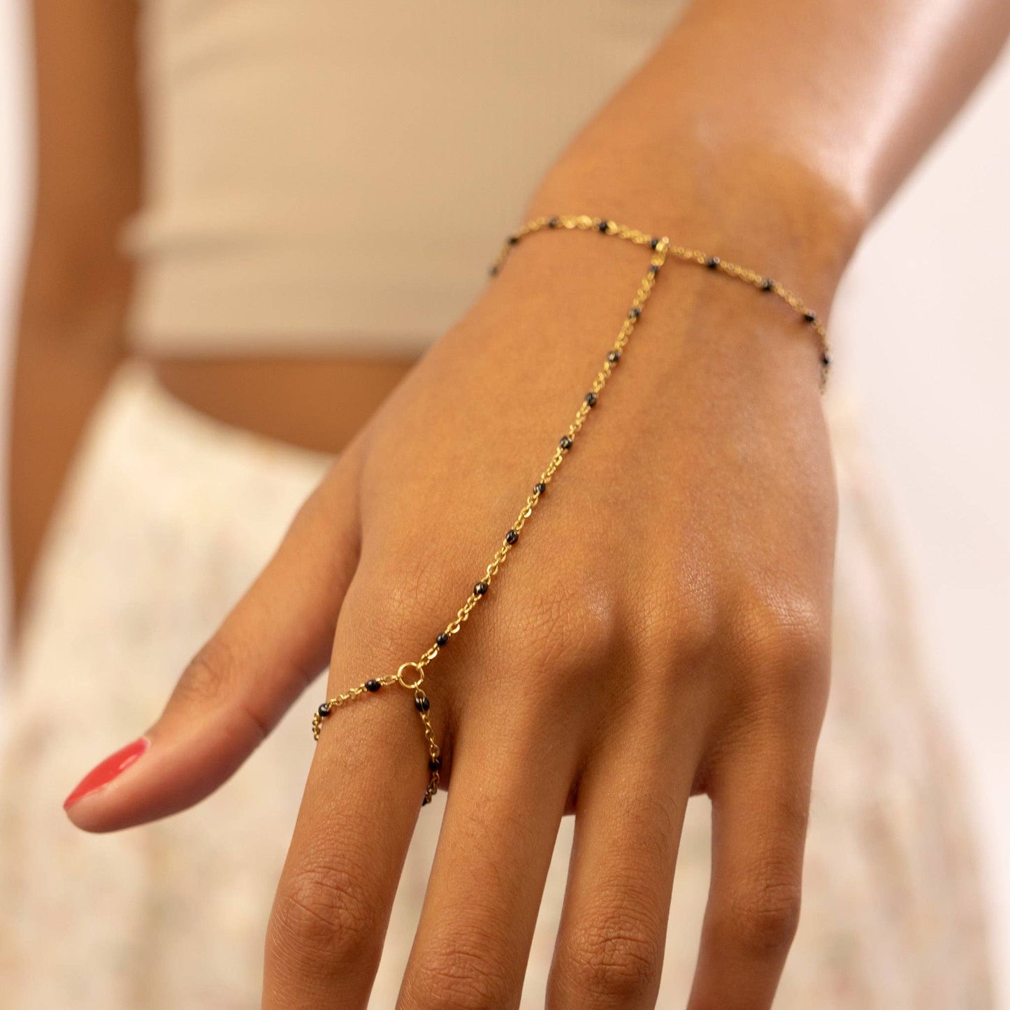 Briana Black Beaded Hand Chain - 18k Gold Plated