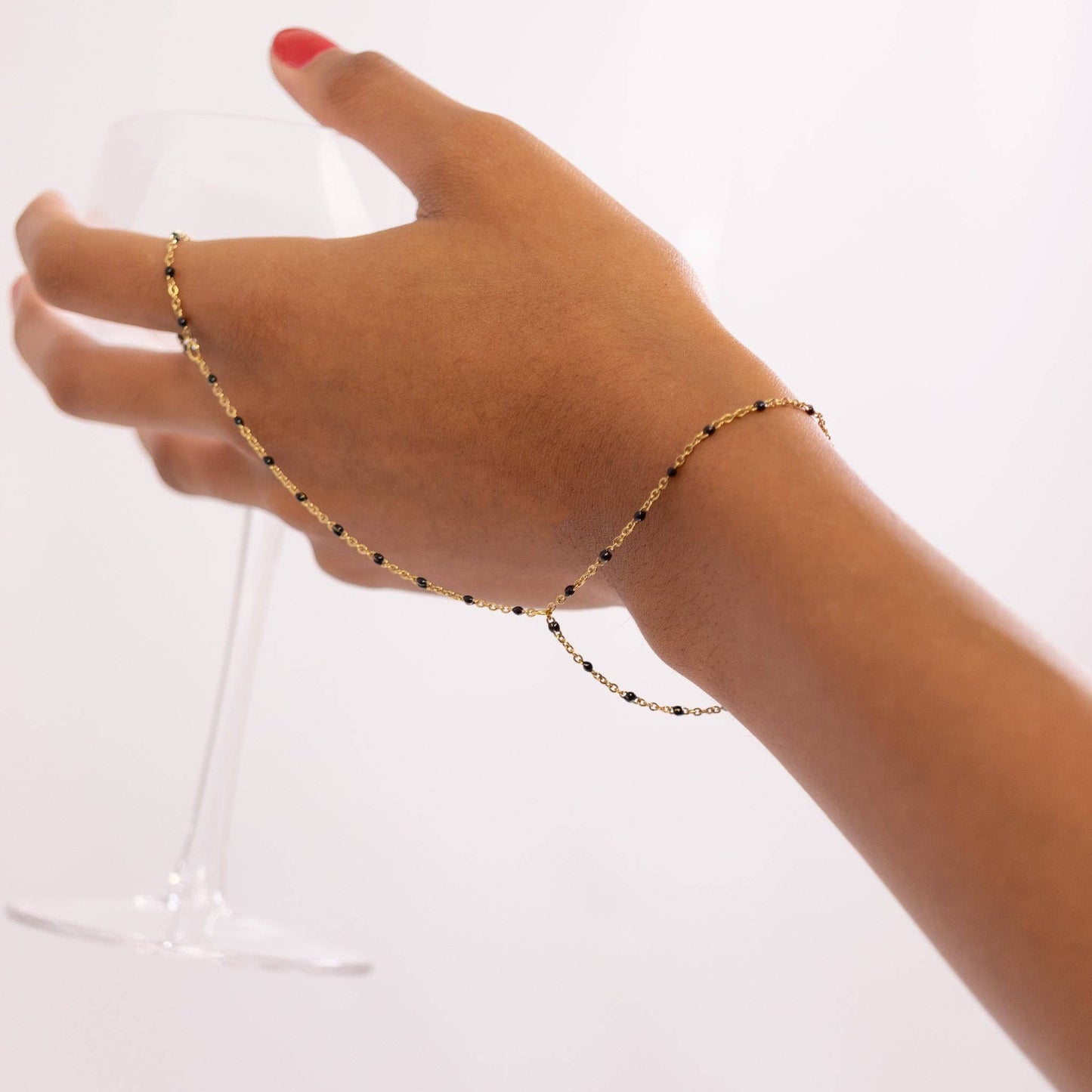 Briana Black Beaded Hand Chain - 18k Gold Plated